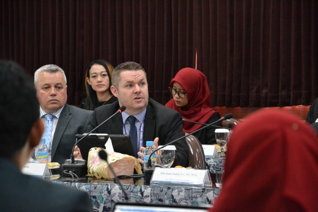 ASIC CEO Lee Hammond delivers an opening presentation to UNAIR leaders.